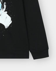 Black sweatshirt with a graphic design on a white background